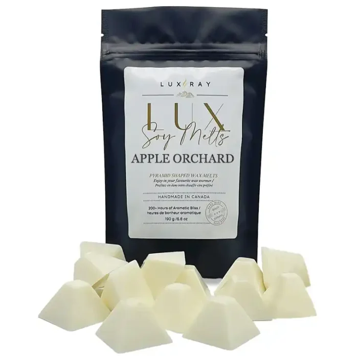 Apple Orchard pyramid melts displayed in front of a 100% recyclable stand-up pouch from Lux Candles & Melts.