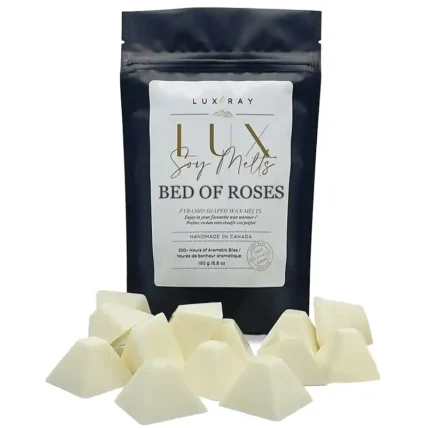 Bed of Roses pyramid melts displayed in front of a 100% recyclable stand-up pouch from Lux Candles & Melts.