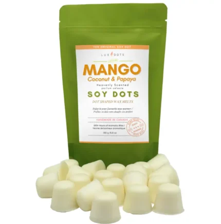 Mango Coconut Papaya wax melt dots displayed in front of a rice paper stand-up pouch from Lux Candles & Melts.