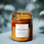 Twisted Spruce Amber Jar Soy Candle by Lux Candles & Melts, capturing the refreshing aroma of pine and spruce in a beautiful amber jar.